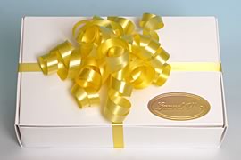 Box wrapped with gold paper.